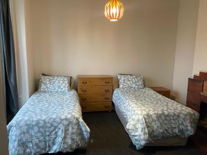 Letto o letti in una camera di Low Cost Accommodation
