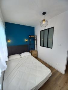 Postel nebo postele na pokoji v ubytování Le Rivage - Vue mer