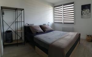 Ένα ή περισσότερα κρεβάτια σε δωμάτιο στο Le Loft