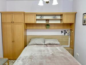 Posteľ alebo postele v izbe v ubytovaní Tavirózsa 1A