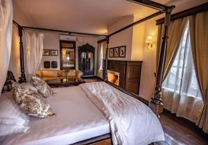 A bed or beds in a room at The Himalayan