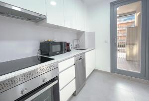 Kuchyň nebo kuchyňský kout v ubytování New apt at the beach of Daimus near Gandia
