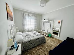 Posteľ alebo postele v izbe v ubytovaní City Rooms