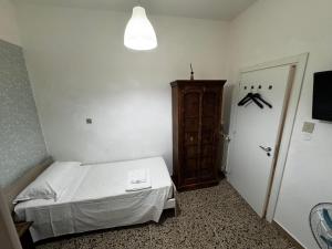 Posteľ alebo postele v izbe v ubytovaní City Rooms