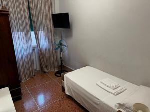 Televízia a/alebo spoločenská miestnosť v ubytovaní City Rooms