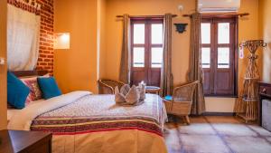 Letto o letti in una camera di Hong Si Hotel- A Home Away from Home