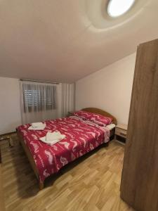 Postel nebo postele na pokoji v ubytování Apartman KOLAREK + 6 fotografií