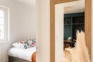 Postel nebo postele na pokoji v ubytování Le Clos Émeraude - Appt de 30 m² à Dinard
