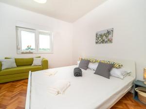 Posezení v ubytování Laganini apartman Rab
