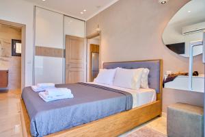 Кровать или кровати в номере Christos Corfu Premium Suites