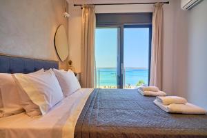 Кровать или кровати в номере Christos Corfu Premium Suites