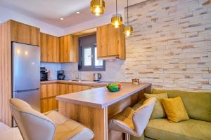 Кухня или мини-кухня в Christos Corfu Premium Suites
