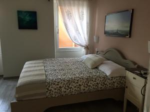 Letto o letti in una camera di La Linea D'Acqua