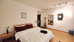 Letto o letti in una camera di Nextdoor Kathmandu