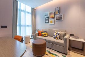 Area soggiorno di Home2 Suite by Hilton Shenzhen Bao'an