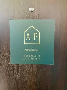 Certyfikat, podpis lub inny dokument wystawiony w obiekcie Apartamenty Wolności 18