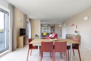 TV a/nebo společenská místnost v ubytování Tuscasì Aparthotel