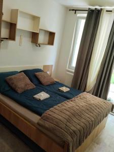 Postel nebo postele na pokoji v ubytování KaiTea Suites