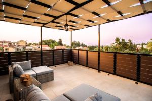 En balkon eller terrasse på Liatiko Cottage House