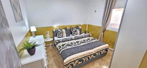 Postel nebo postele na pokoji v ubytování Casa Dom 2