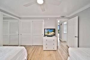Voodi või voodid majutusasutuse Loggerhead Cay #112 toas