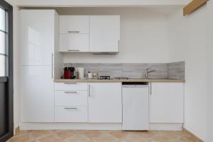 Η κουζίνα ή μικρή κουζίνα στο L'Entre 2 +13 φωτογραφίες
