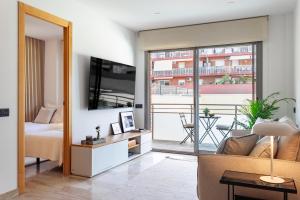 โทรทัศน์และ/หรือระบบความบันเทิงของ Cozy Apartment II - Les Corts