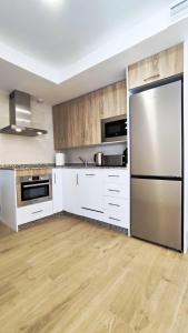 Kuchyň nebo kuchyňský kout v ubytování Terraza Suites Benidorm
