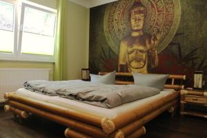 Postel nebo postele na pokoji v ubytování REGIOHOTEL Schanzenhaus Wernigerode