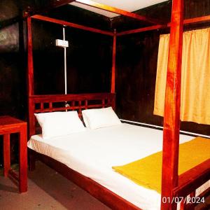 Katil atau katil-katil dalam bilik di T-More Hotel & Hostel