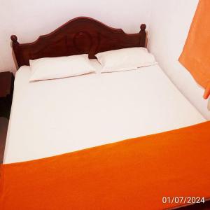 Katil atau katil-katil dalam bilik di T-More Hotel & Hostel