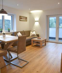 Un lugar para sentarse en Mountain View Appartements mit Blick