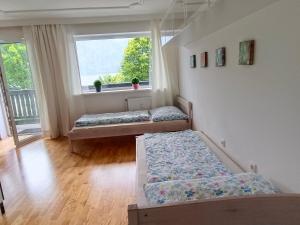 Posteľ alebo postele v izbe v ubytovaní Suite-Traunsee