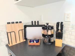 a kitchen counter with a coffee maker on it at Lake, mountain view cottage - near major attractions in Rotorua