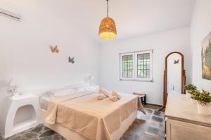 Ένα ή περισσότερα κρεβάτια σε δωμάτιο στο Selena Seaview Villa