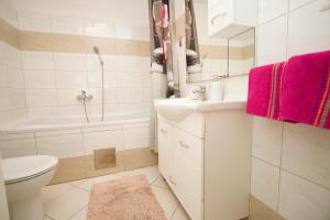 Kúpeľňa v ubytovaní Apartmani Pašalić
