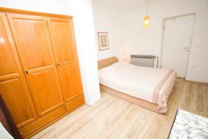Posteľ alebo postele v izbe v ubytovaní Apartmani Pašalić
