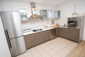 Kuchyňa alebo kuchynka v ubytovaní Apartmani Pašalić