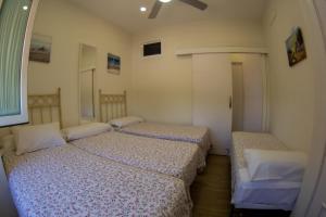 Posteľ alebo postele v izbe v ubytovaní Casita de María