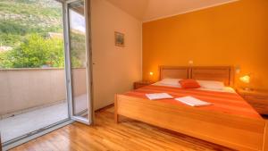 Posteľ alebo postele v izbe v ubytovaní Apartment Villa Molina