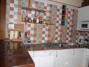 Kuchyň nebo kuchyňský kout v ubytování Casa Gilbuena