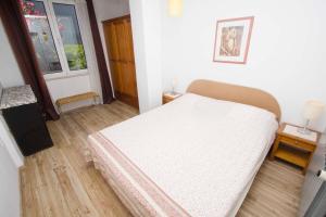Posteľ alebo postele v izbe v ubytovaní Apartmani Pašalić