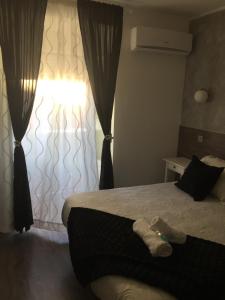 
Cama o camas de una habitación en Hostal Meyra
