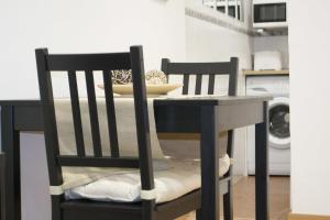 Postel nebo postele na pokoji v ubytování Apartamenticos Boggiero IV
