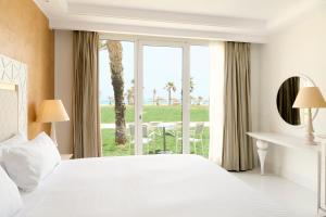 Postel nebo postele na pokoji v ubytování Iberostar Selection Eolia Djerba