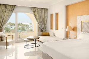 Iberostar Selection Eolia Djerba客房内的一张或多张床位