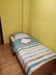 En eller flere senge i et værelse på Miriam