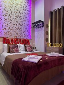 Letto o letti in una camera di Atanasia Suite
