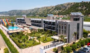 an aerial view of a hotel with a pool and resort at Nuevo Deluxe in Shëngjin