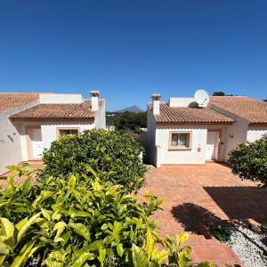 a view of two houses and a brick yard at Villas Monte Jávea - BTB in Jávea